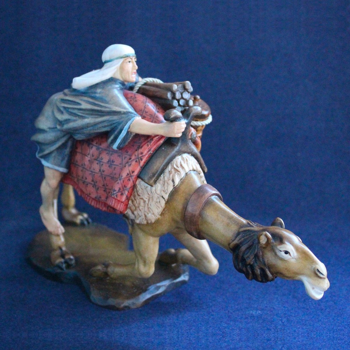 Statuina presepe mercante nel deserto